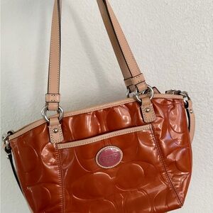 Coach Embossed Orange Shoulder Bag